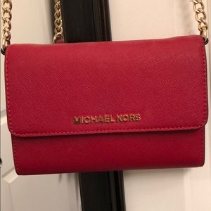 Red Michael Kors crossbody bag